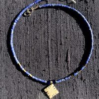 Tiny Lapi Lazuli and a coptic cross